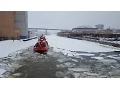 Edward M. Cotter fireboat breaks ice in Buffalo River to prevent flooding