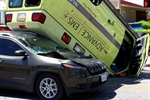 Corpus Christi (TX) Ambulance Flips Onto Vehicle