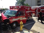 Ambulance Carrying Patient Collides with SUV