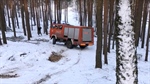 European Fire Apparatus Slides Off-Road from Snow-Covered Grade