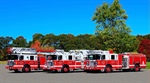 Three-Rig Delivery Includes Straight Stick, Platform, and Pumper