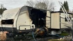 Vancouver Firefighters extinguish trailer fire