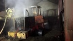 Fire crews battle tractor fire in storage shed near Prosser