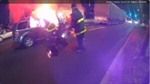 VIDEO: Michigan firefighter pulls woman from burning SUV, family calls him a hero