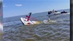 Whale sinks New Jersey fire department boat; bystanders come to the rescue
