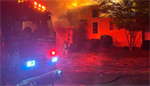Tacoma house fire sparked by fireworks in nearby garbage can