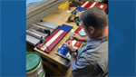 ‘Every hose has a story’: Central Indiana firefighters turn retired fire hoses into patriotic art, honoring fallen heroes