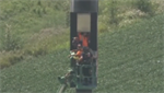 Worker rescued after being stranded in 130-foot-tall gas station sign for hours in Illinois