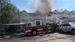 Crews respond to an apartment fire in Spokane Valley