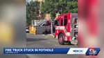 New Orleans Fire Truck Stuck in Central City Pothole