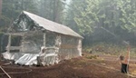 Firefighters wrap buildings as wildfires menace structures in North Cascades