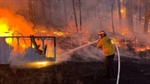 Officials warn wildfire season far from over as 15 large fires burn statewide