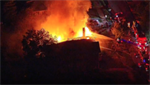 VIDEOS: Fire at vacant home in Michigan spreads to house next door, no injuries reported