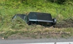 Driver rescued from ditch as car sinks into water