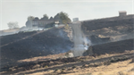 One resident praises firefighters for quick response in saving her home during morning brush fire