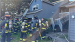 Woman hospitalized after rescue from fire at Vancouver apartment complex