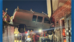 PHOTOS: Van gets stuck between wall, building after crash in Georgia