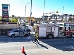 Car Sandwiched Between Dump Truck, Calgary (Canada) Fire Apparatus