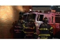 FDNY truck crashes into building while responding to call