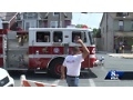 Firetruck, sirens blaring, celebrates girl's return home after 5 months in hospital