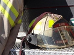 Can firefighting gear be decontaminated on scene?