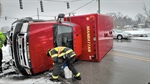 Ambulance Flipped on Side in Crash